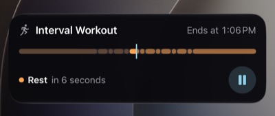 A Live Activity on the Lock Screen for Interval Workout, with the end time, the next exercise and a Pause button.